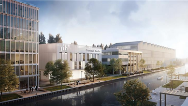 Modern buildings by the water, including the Berlin campus, surrounded by trees and walkways. Bright architecture and a tranquil atmosphere.