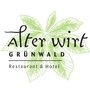 Logo des Restaurants und Hotels "Alter Wirt" in Grünwald, umgeben von einer stilisierten grünen Pflanze.
