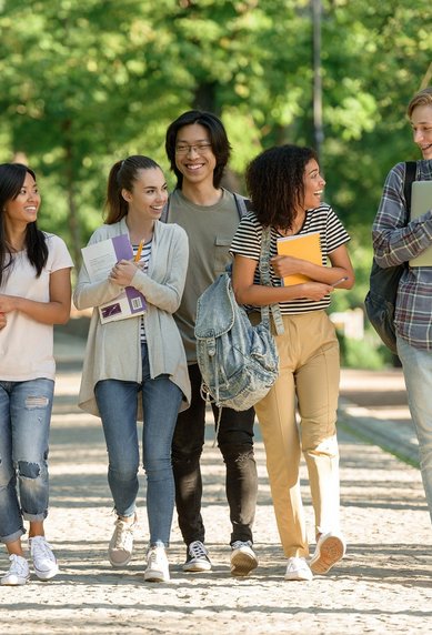 International students walk together across the campus.
