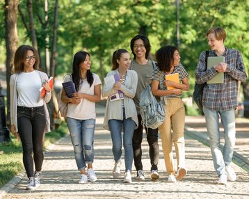 International students walk together across the campus.