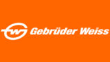 Logo von Gebrüder Weiss auf orangefarbenem Hintergrund, bestehend aus einem stilisierten "GW" und dem Schriftzug "Gebrüder Weiss".
